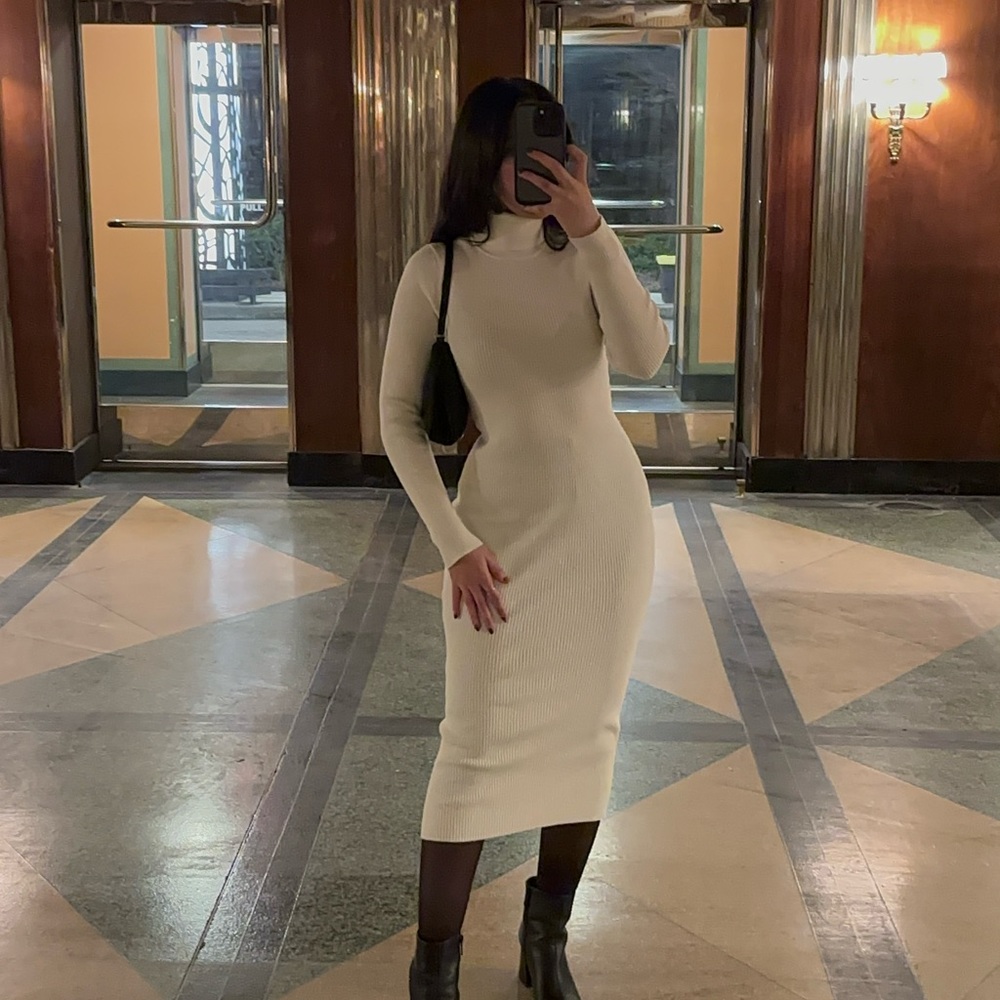 White dress with high neck.